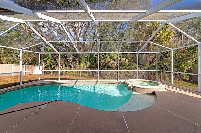 view of pool featuring an in ground hot tub and glass enclosure