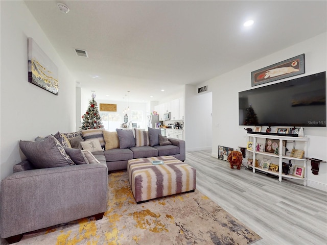 living room featuring light hardwood / wood-style floors