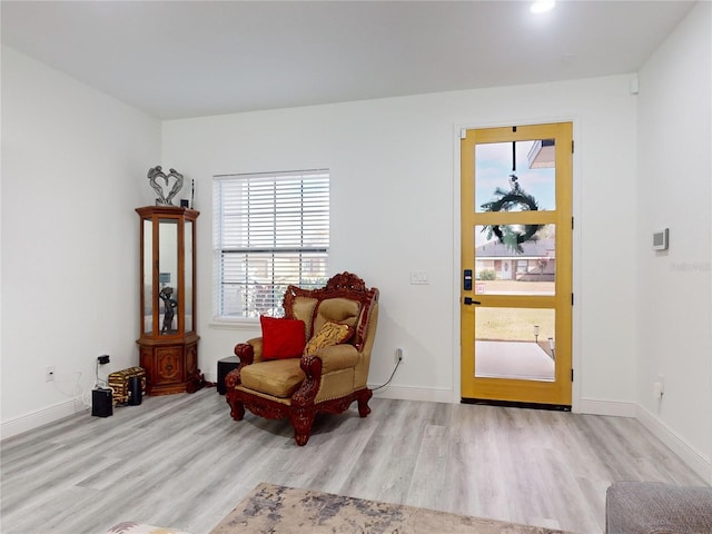 sitting room featuring light wood-type flooring