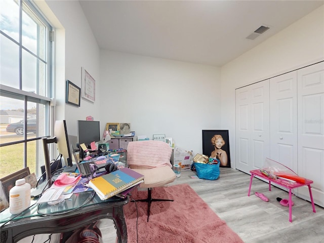 office area with light hardwood / wood-style flooring