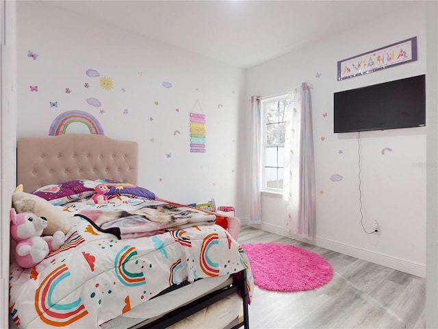 bedroom featuring light hardwood / wood-style flooring