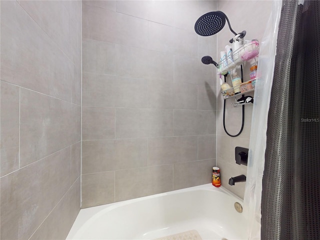 bathroom featuring shower / bathtub combination with curtain