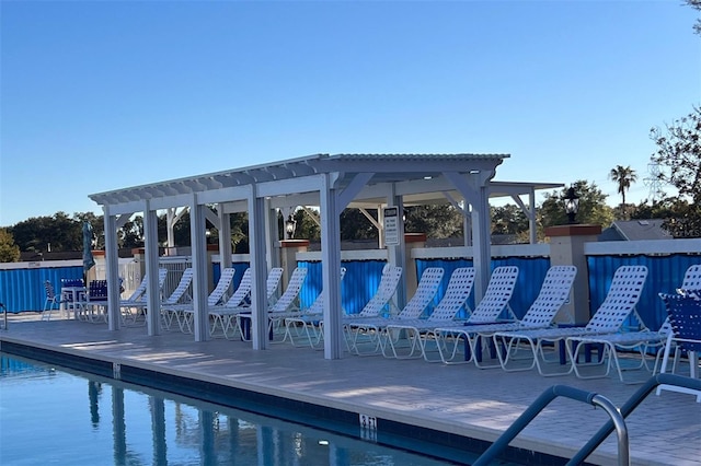 view of pool with a pergola