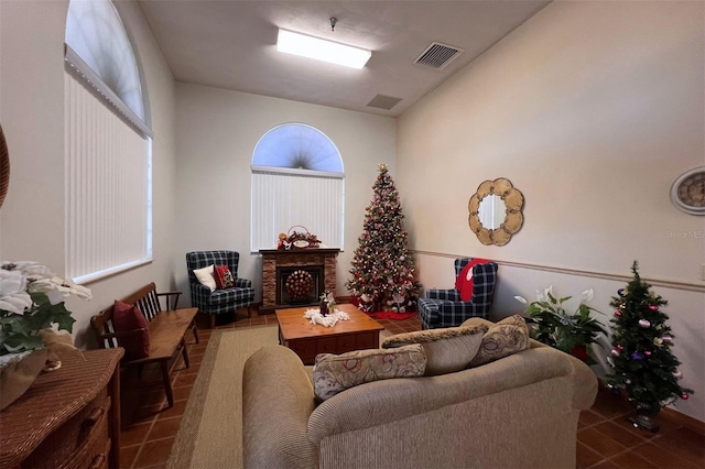 tiled living room featuring a wealth of natural light