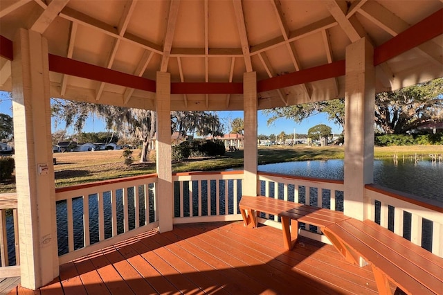 deck featuring a gazebo and a water view