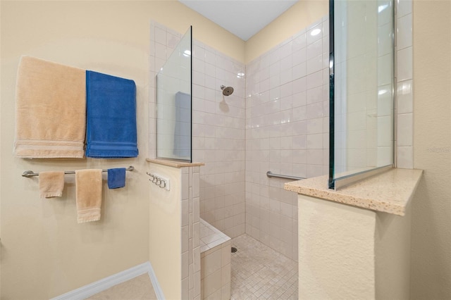 bathroom featuring a tile shower