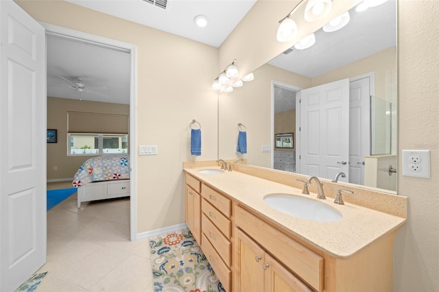 bathroom featuring vanity, tile patterned floors, and ceiling fan