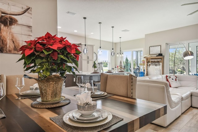 dining area featuring a chandelier