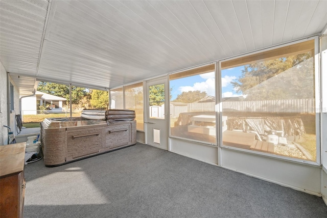 sunroom / solarium featuring a healthy amount of sunlight