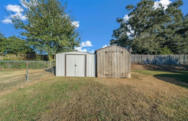 view of outbuilding featuring a lawn