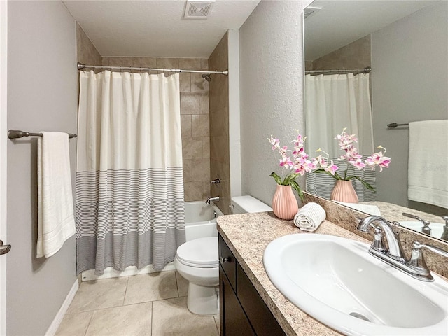 full bathroom with tile patterned flooring, shower / tub combo, vanity, and toilet