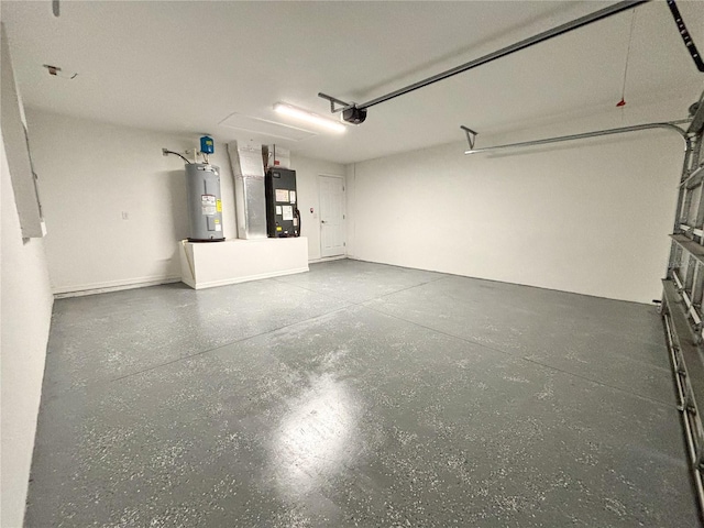 garage featuring electric water heater, heating unit, and a garage door opener