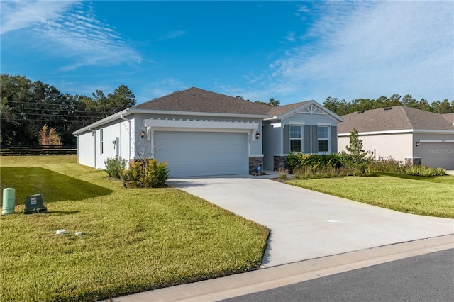 single story home featuring a front lawn and a garage