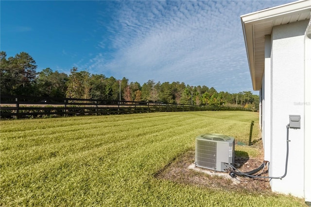 view of yard featuring central AC unit