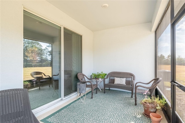 sunroom / solarium featuring a wealth of natural light