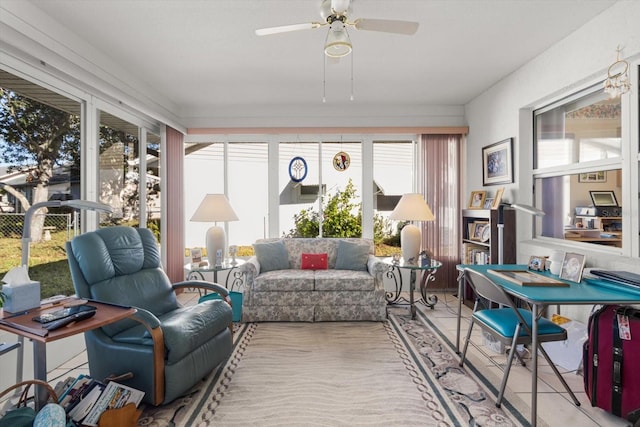 sunroom with ceiling fan