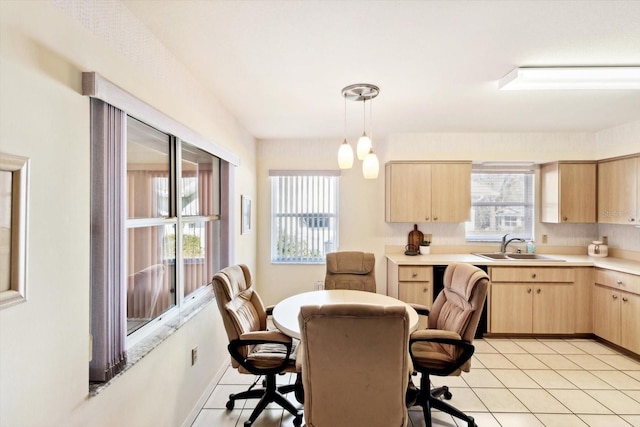 tiled dining area with sink