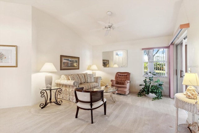 carpeted living room featuring lofted ceiling and ceiling fan