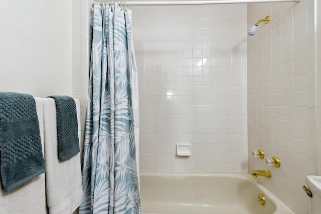 bathroom featuring shower / bath combination with curtain