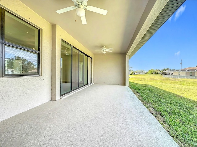 view of patio / terrace featuring ceiling fan