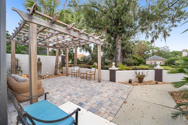 view of patio featuring a pergola