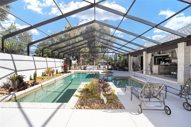 view of swimming pool with a patio, area for grilling, ceiling fan, and a lanai