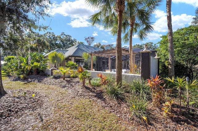 exterior space featuring a pergola