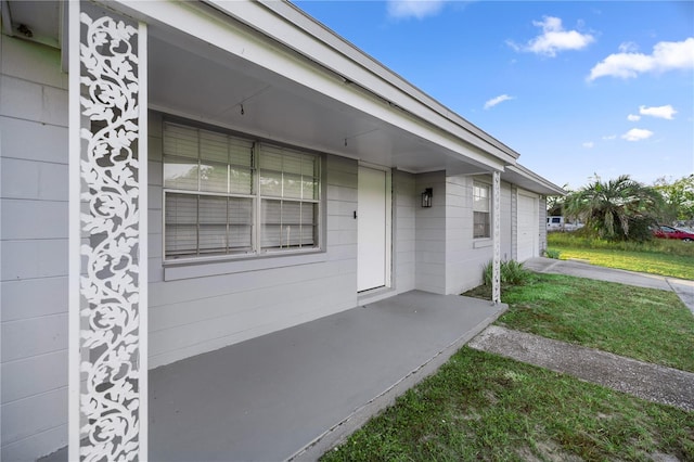 entrance to property featuring a garage