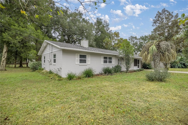 exterior space with a lawn