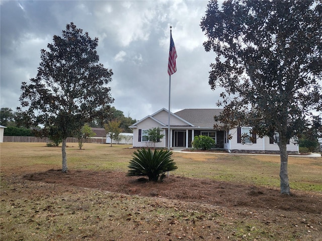 view of front of house with a front lawn