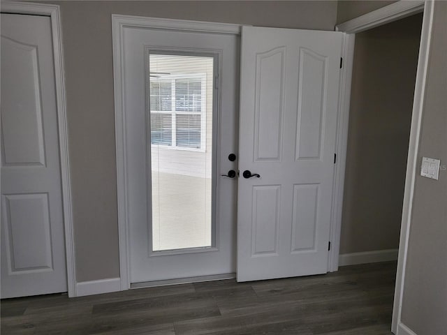 doorway featuring dark hardwood / wood-style floors