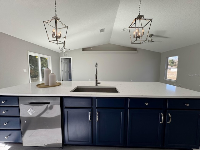 kitchen with a wealth of natural light, dishwasher, vaulted ceiling, and sink