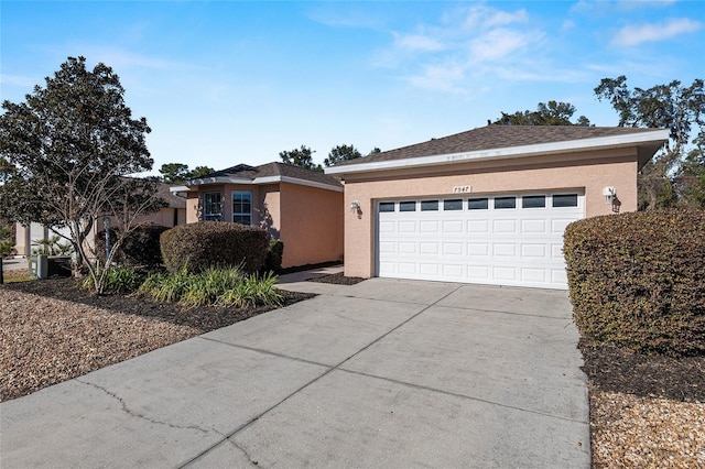 single story home with a garage