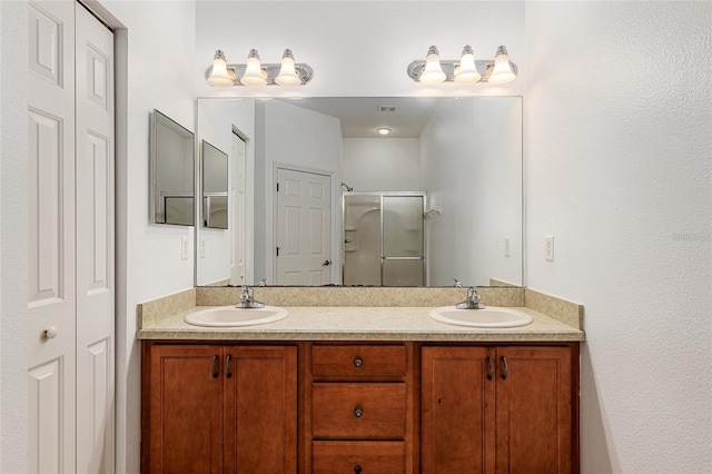 bathroom featuring vanity and walk in shower