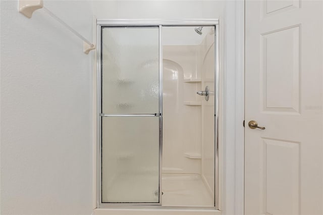 bathroom featuring walk in shower