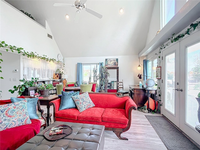 living room with french doors, high vaulted ceiling, and ceiling fan