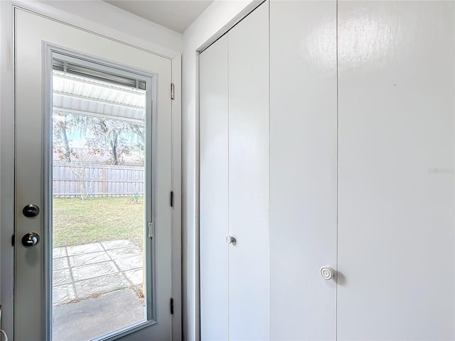 doorway to outside featuring a wealth of natural light