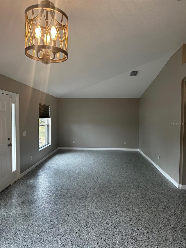 unfurnished living room with a textured ceiling, a chandelier, and lofted ceiling