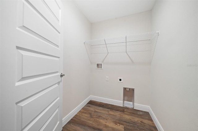 laundry area featuring electric dryer hookup, hookup for a washing machine, and dark hardwood / wood-style floors