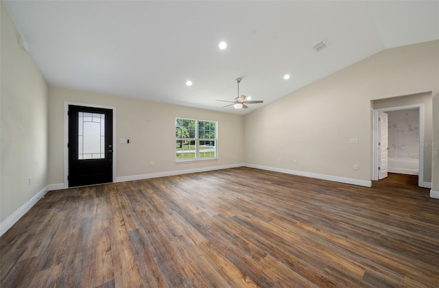 interior space with lofted ceiling, ceiling fan, and dark hardwood / wood-style floors