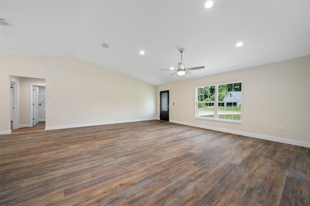 empty room with dark hardwood / wood-style floors, ceiling fan, and lofted ceiling