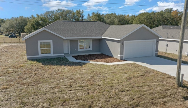 ranch-style house with a front yard and a garage