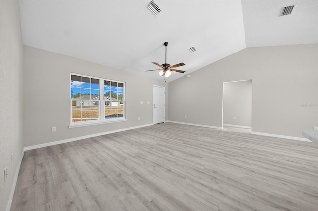 unfurnished room with light wood-type flooring, ceiling fan, and lofted ceiling