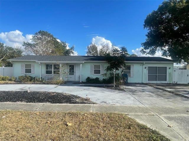 single story home with covered porch