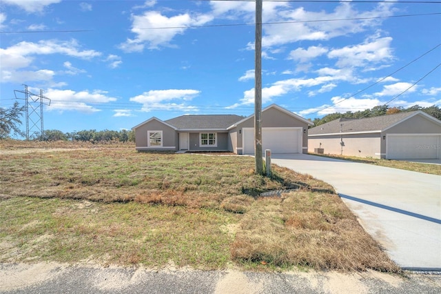 single story home featuring a garage