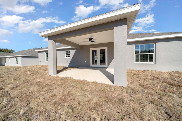 back of property featuring a patio area and french doors