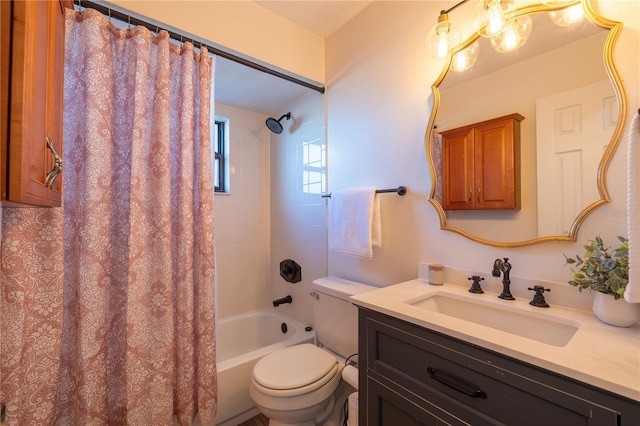 full bathroom featuring shower / bath combo, vanity, and toilet