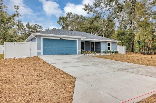 ranch-style home with a garage