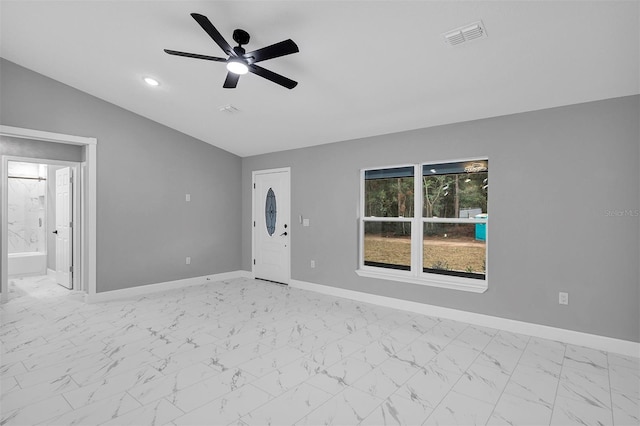 interior space featuring ceiling fan and vaulted ceiling