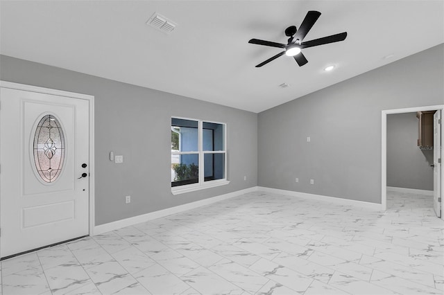 entrance foyer featuring ceiling fan and lofted ceiling